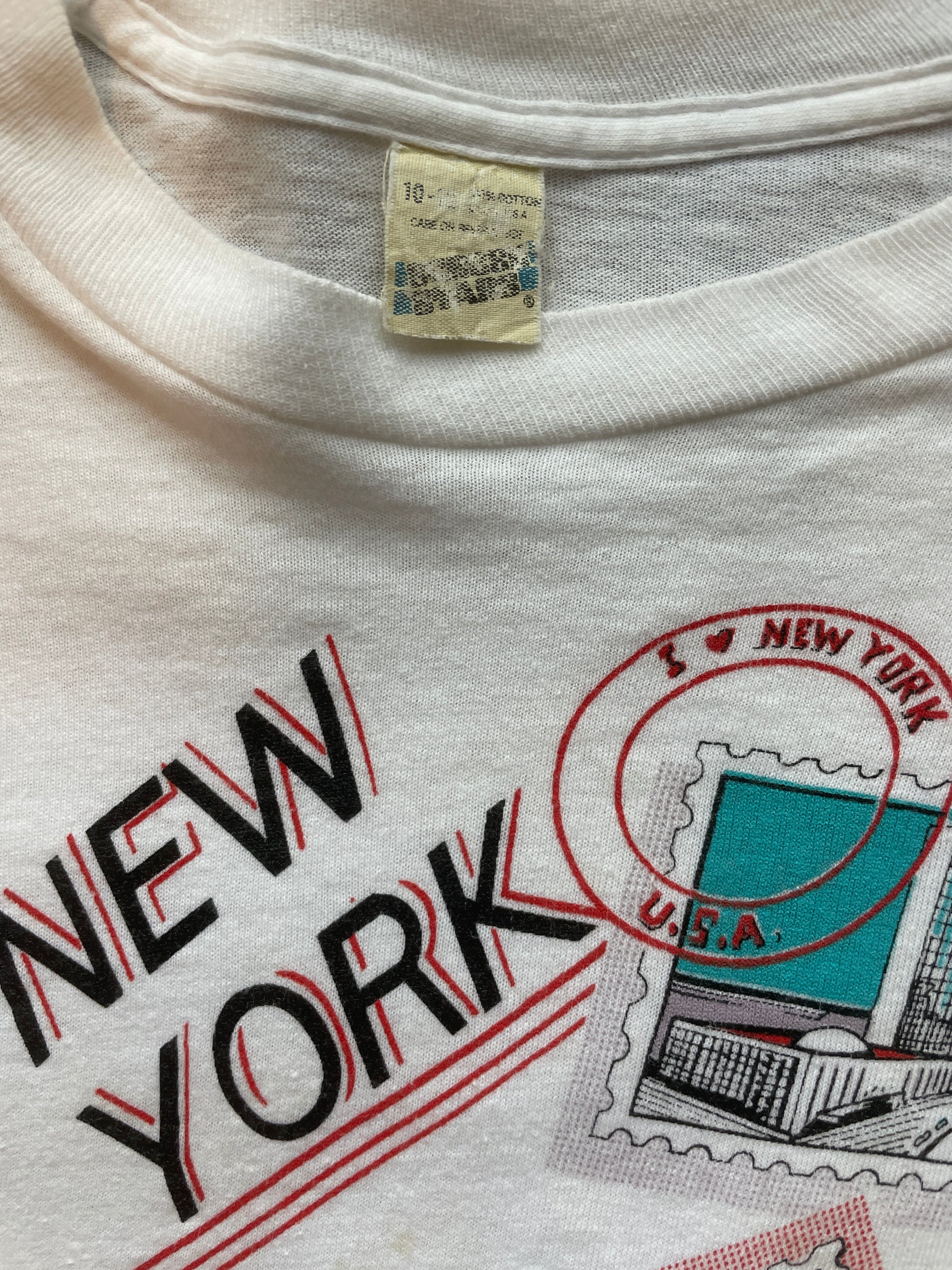 1989 SCREEN STARS NYC STAMPS BABY TEE